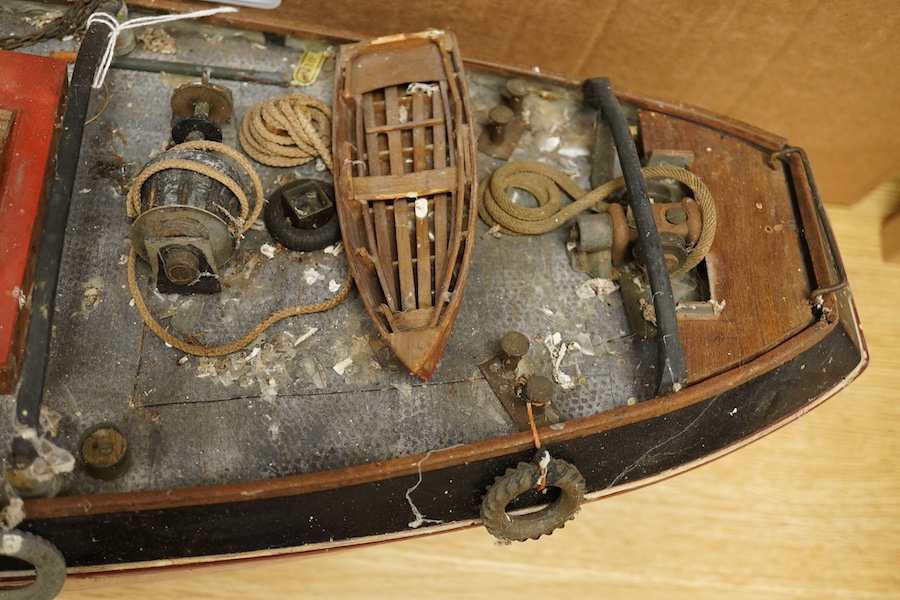 A scale model of a tug boat ‘T.I.D 4’, a well detailed model with the remains of internal wiring and electric motor for use as a pond yacht, length of hull approx 92cm. Condition - poor to fair, now in need of some resto